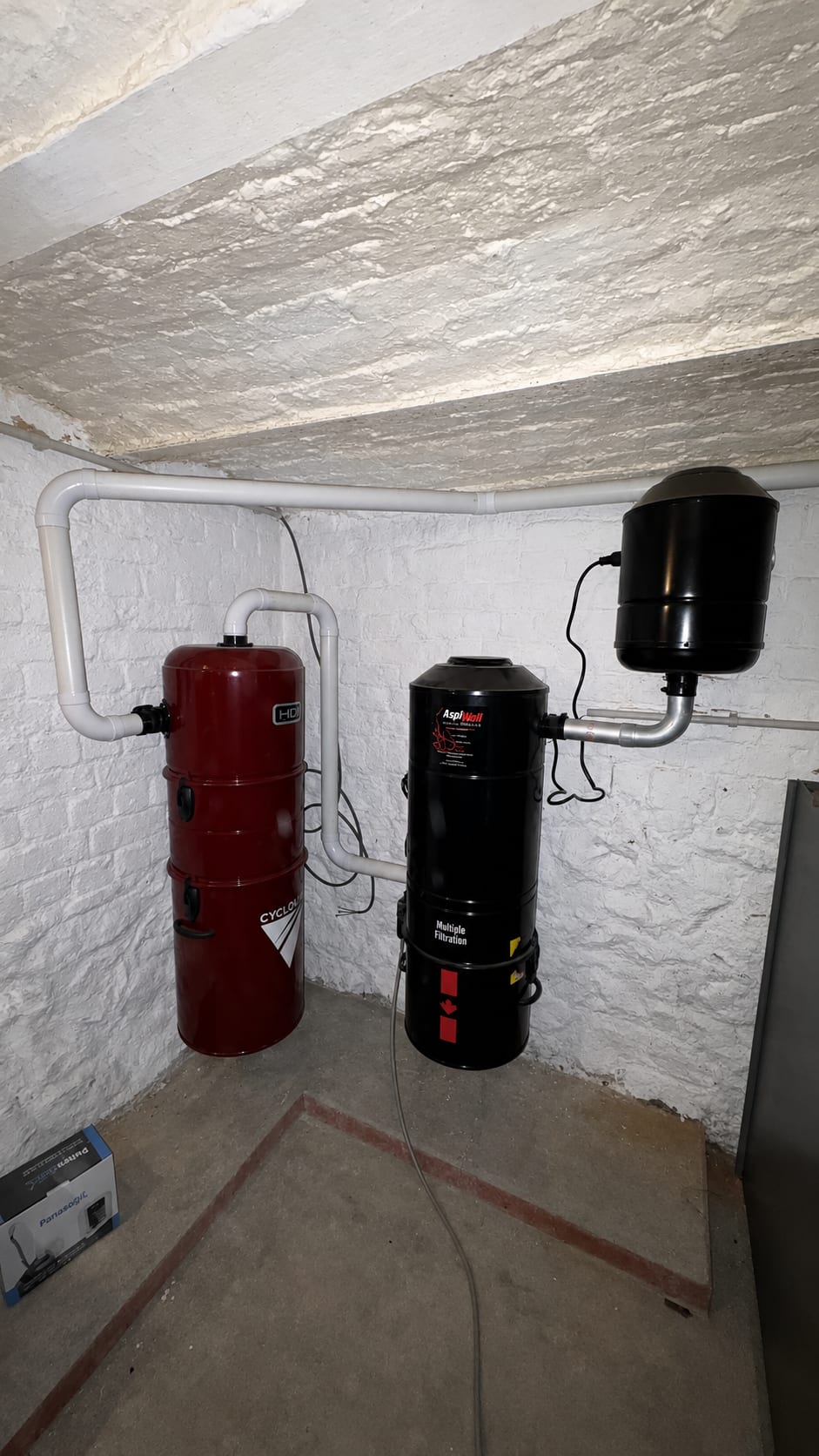 Burgundy Cyclovac HD cyclonic interceptor and AspiWall S500 central unit installed in a cellar in Beaumont